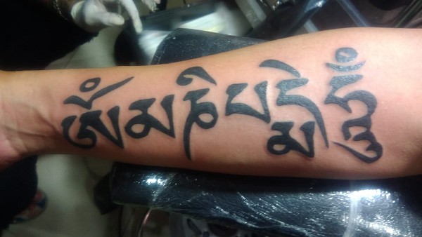 Agus - Tibetan Om Mani Padme Hum tattoo