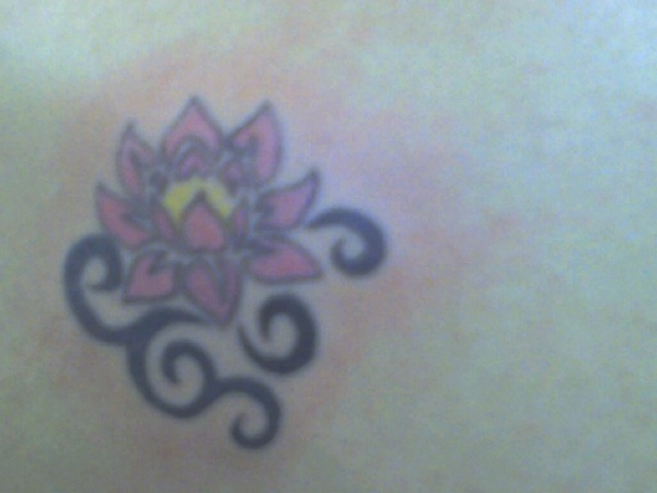 Amber - Tribal lotus tattoo photo