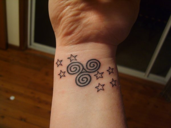 Amiee - Triskell and stars tattoo