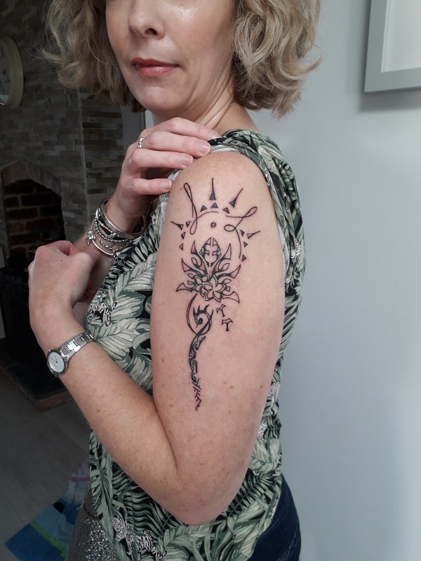 Angela - Family lotus tattoo