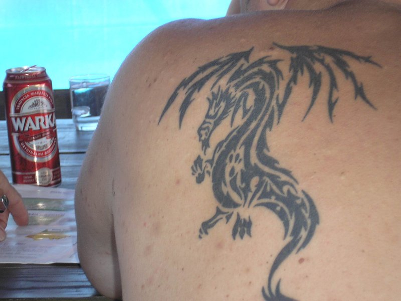 Bartek - tribal dragon tattoo