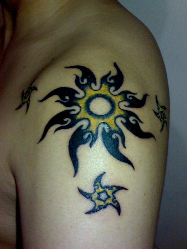 James - Sun and stars tattoo