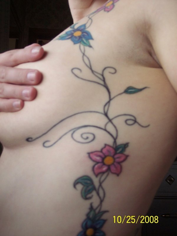 Cecilia - Vine of flowers tattoo