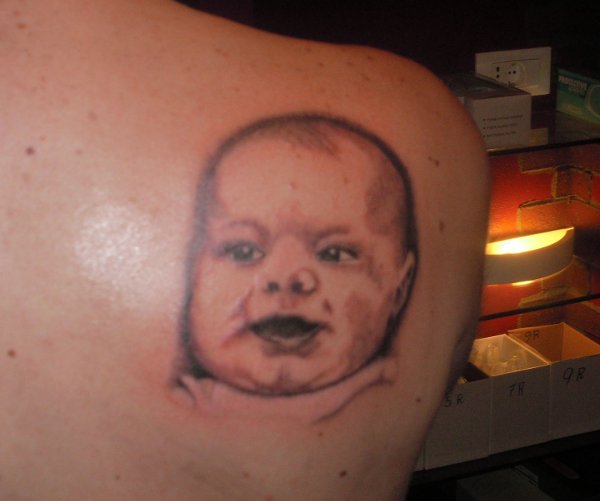 Evil Zone - Baby portrait tattoo photo