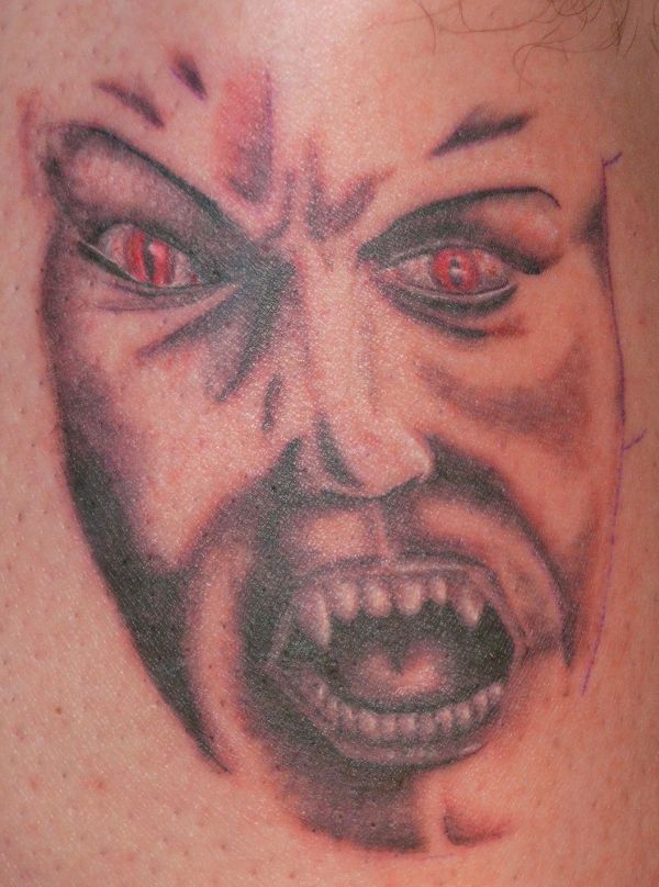 Evil Zone - Demon's face tattoo