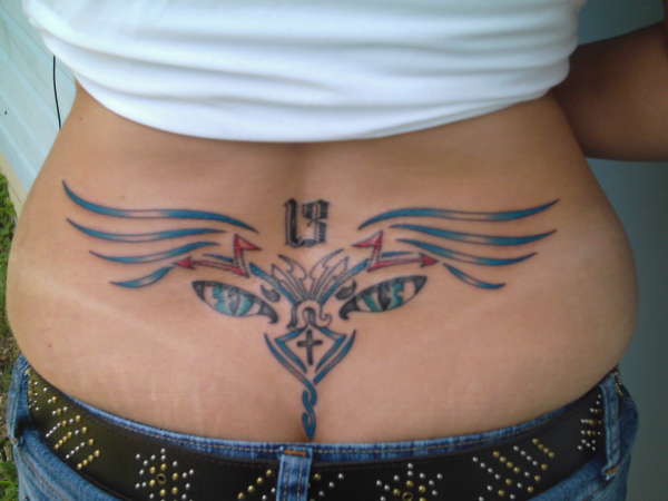 Felicia - winged lowerback tattoo