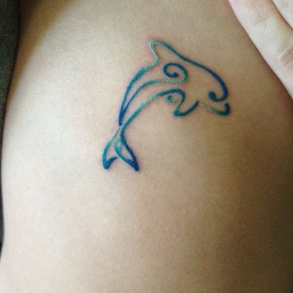 Guest - stylized dolphin tattoo photo