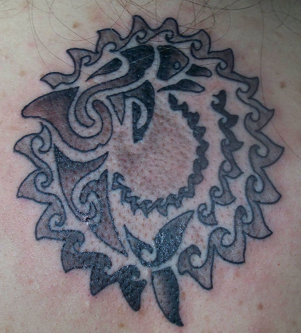 Jennifer - Sun dolphin tattoo