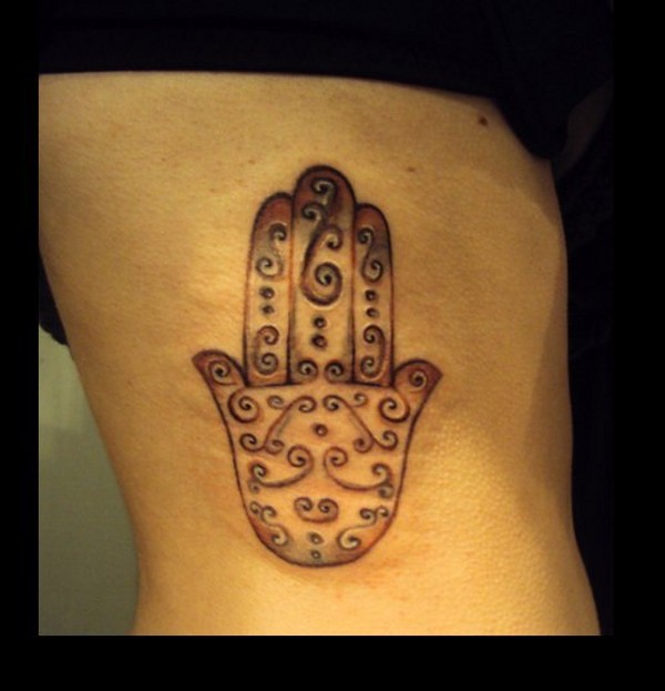 Melania - Hamsa tattoo