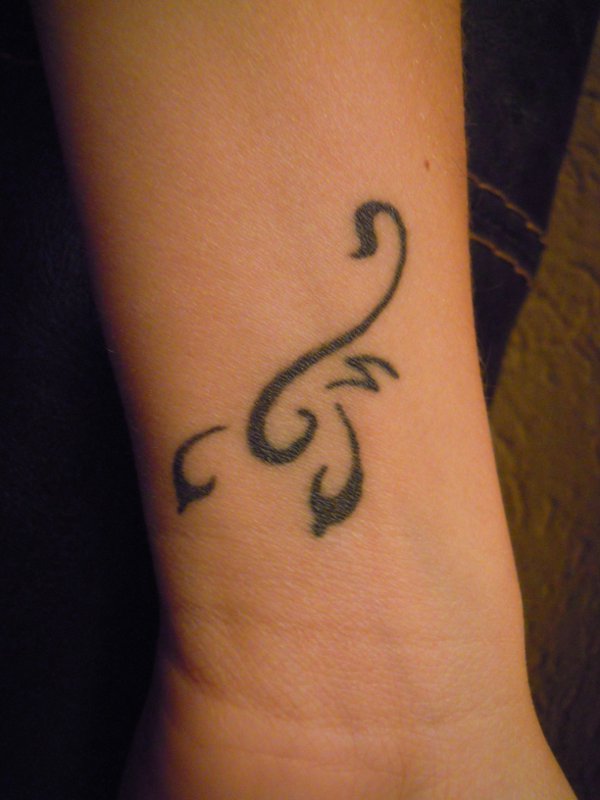 Renata - Stylized scorpion tattoo