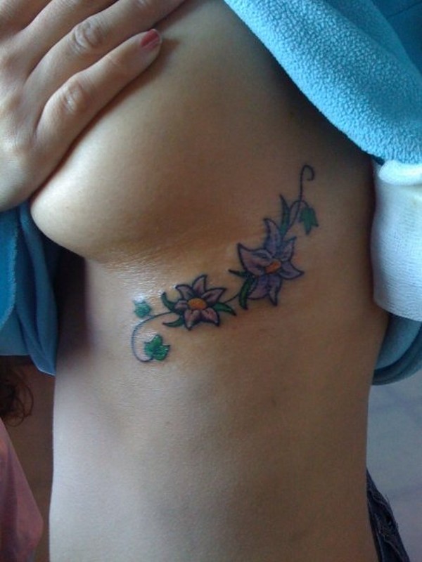 Sara - Ivy and flowers tattoo