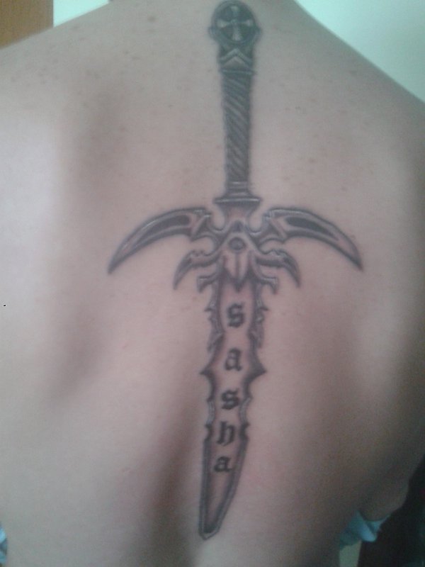 Sergio - sword tattoo photo