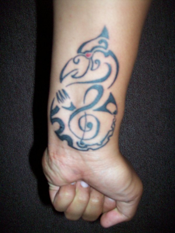 Souls - Manaia and treble clef tattoo