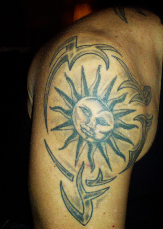 Stian - Tribal sun tattoo