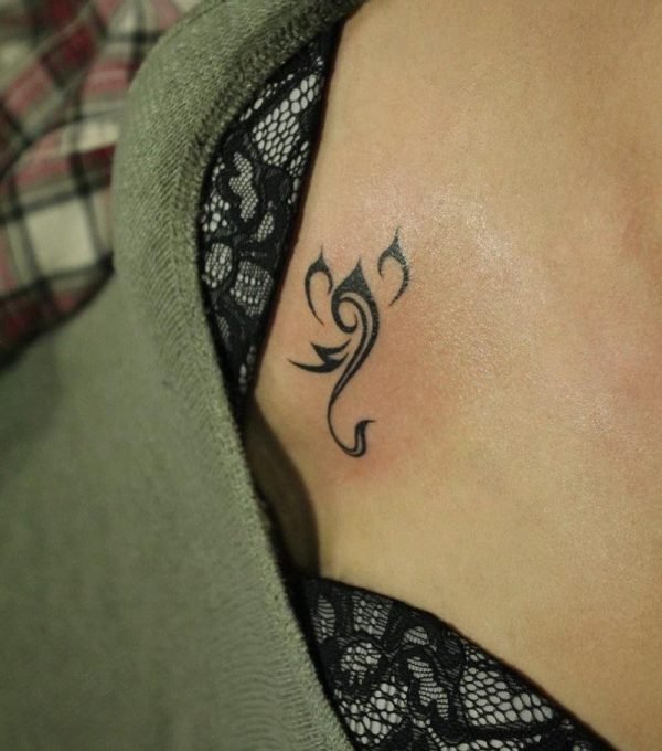 Guest - Stylized scorpion tattoo